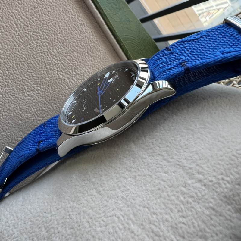 Gucci G-Timeless Stars and Planet Unisex Watch with Blue Strap